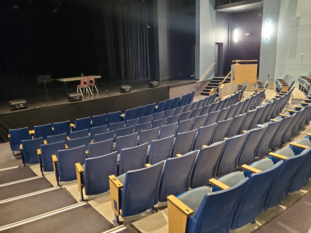 Looking down at the stage from the midpoint in the auditorium